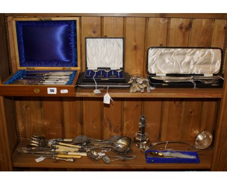 Large lot of EPNS cutlery and servers some with mother-of-pearl handles together with a large ladle and sugar shaker