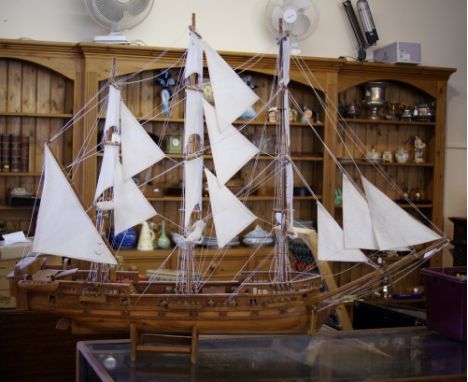 Solid wood, possibly teak, model of a sailing ship brought from Malaysia around 30 years ago (64 cm high x 118 cm)