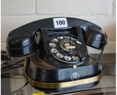 Vintage 1940s Anvers Belgique F.T.R. Bell telephone in black and Bakelite case with gilding and monogramme R.T.T. model 56B. 