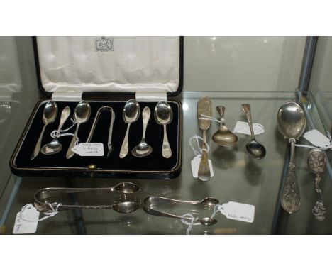 A set of six silver teaspoons and sugar tongs Sheffield 1959 in a presentation box, two other pairs of silver sugar tongs, si