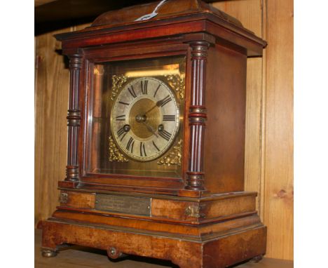 Mahogany presentation bracket clock with brass and gilt decoration and windowed front and back panel (back glass missing) wit