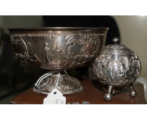 Antique embossed silver-footed sugar bowl depicting rural figures 4.23 oz, together with an embossed white metal pepper pot d