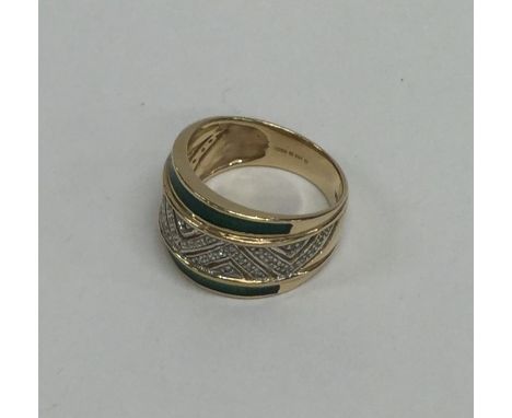 A 9 carat enamel and diamond ring. Approx. 6 grams. Est. £70 - £80.