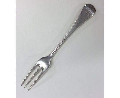 A Georgian silver Hanoverian pattern three prong fork. London. Approx. 69 grams. Est. £45 - £55.
