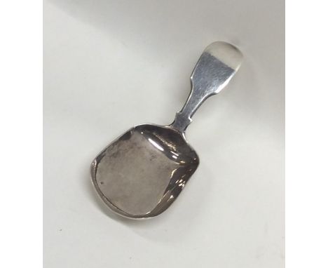 A Georgian silver caddy scoop. London. By WK&amp;SK. Approx. 10 grams. Est. £30 - £50.