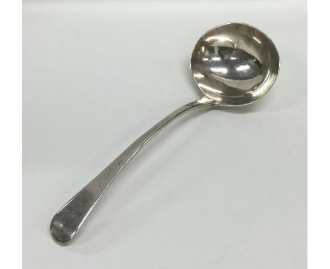 A Georgian silver OE pattern sauce ladle with crested terminal. London. By WE. Approx. 60 grams. Est. £35 - £55.