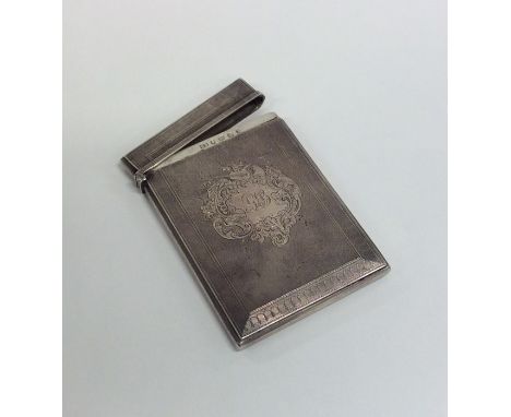 A good quality Victorian silver engine turned card case attractively decorated with flowers and leaves. London. By ES. Approx