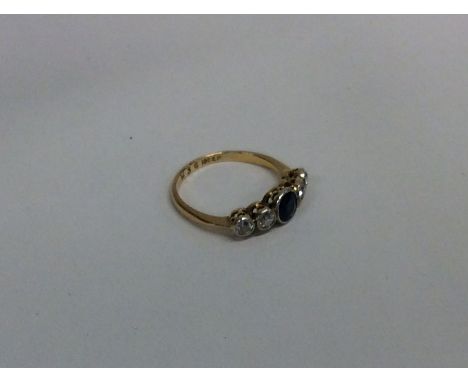 A sapphire and diamond five stone ring in rubover mount. Approx. 2 grams. Est. £200 - £300.