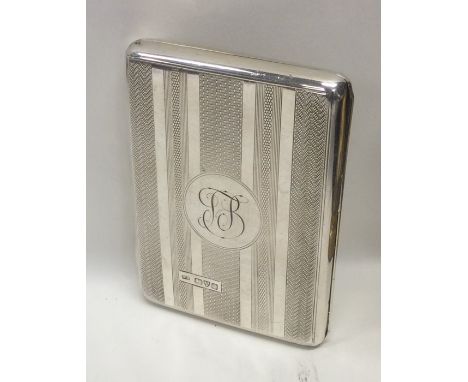 An engine turned hinged silver wallet with fitted leather interior. Chester. By WN. Approx. 123 grams. Est. £30 - £50.