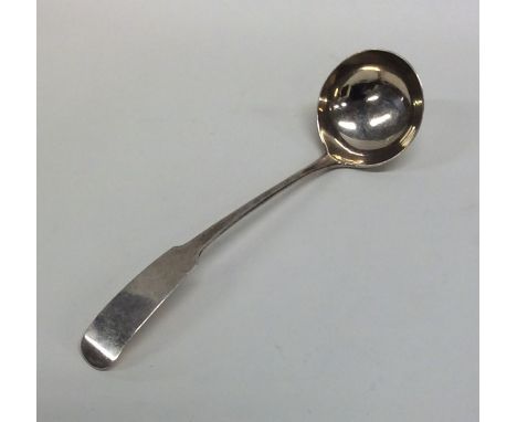 EDINBURGH: A Scottish silver fiddle pattern sauce ladle. By WM. Approx. 19 grams. Est. £30 - £50.
