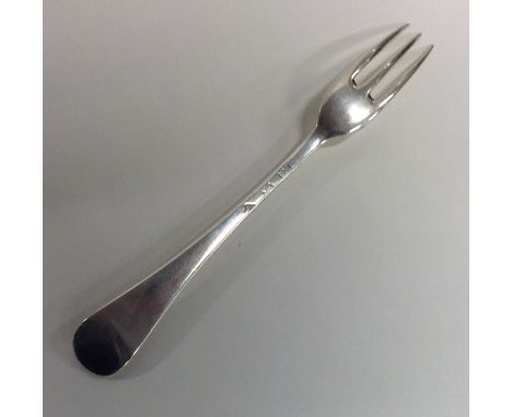 A Georgian silver Hanoverian pattern three prong fork. London. Approx. 59 grams. Est. £45 - £55.