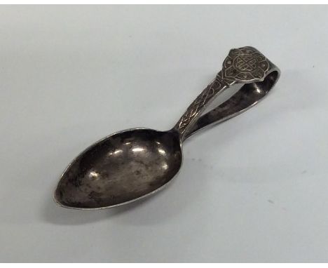 A Celtic silver caddy spoon of tapering form. Sheffield. By CB&amp;S. Approx. 23 grams. Est. £30 - £40.