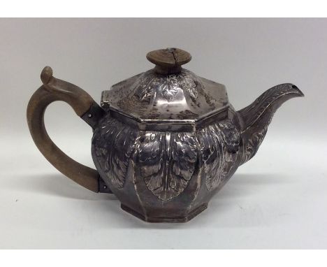 An attractive and unusual Victorian silver teapot with fluted decoration. London. By TH. Approx. 282 grams. Est. £300 - £350.