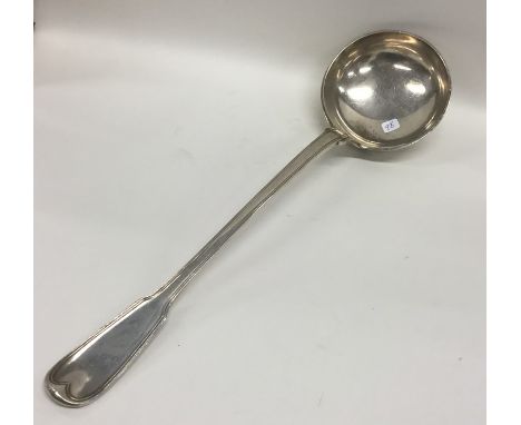 A heavy French silver fiddle and thread pattern ladle. Approx. 225 grams. Est. £180 - £220.