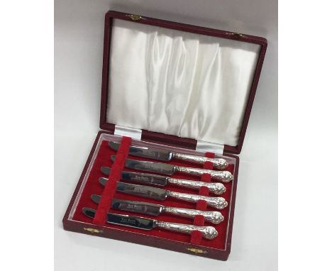 A set of six Kings' pattern silver mounted tea knives. Sheffield. By HB. Approx. 112 grams. Est. £25 - £35.