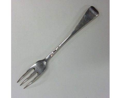 A Georgian silver Hanoverian pattern three prong fork. London. Approx. 62 grams. Est. £45 - £55.