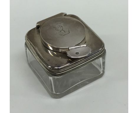 An unusual Victorian silver and glass mounted travelling inkwell. Est. £70 - £80.