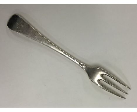 A Georgian silver Hanoverian pattern three prong fork. Approx. 59 grams. Est. £45 - £55.