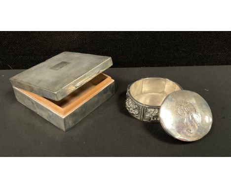 A Victorian silver and Indian white metal oval lidded box, the cover, Dublin 1898 (20G), on white metal base cast with Deitie
