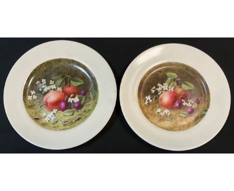 A pair of hand painted Coalport porcelain side plates, painted with Apples, Damsons and blossoms, printed and impressed marks