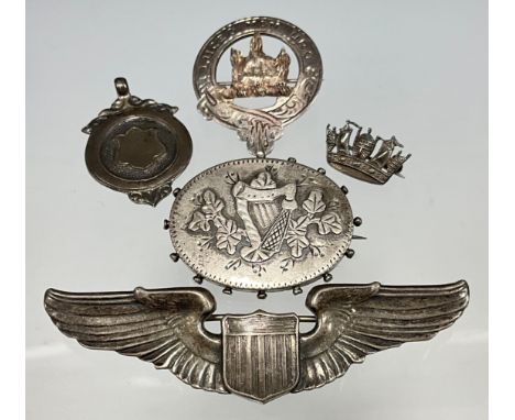 A WW II period sterling silver American Pilots wings pin brooch, stamped sterling, 7.7cm wide, Clan Mackenzie Scottish silver