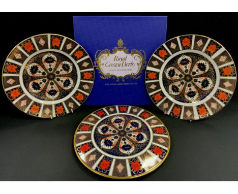Royal Crown Derby 1128 Old Imari plates, 27cm diameter, tea pot stand, boxed, all first quality (3)