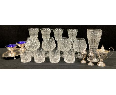 A Victorian style silver plated cruet set, the bowls decorated with urns among floral swags, the tray supported by four ball 