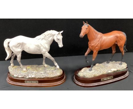 A Royal Doulton figure DA134 Dessert Orchid, modelled by J R Tougue, limited edition 3614/7500, with plinth base, another Red