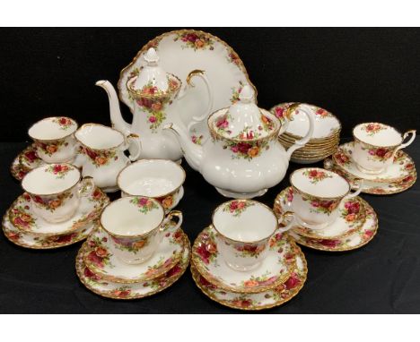 Royal Albert Old Country Roses tea service comprised of a tea pot, coffee pot, milk jug, sugar bowl, six tea cups and saucers