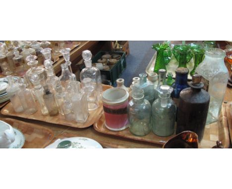Two trays of mainly assorted glassware items to include pair of candlesticks, vintage bottles, chemist bottles, stoneware bot