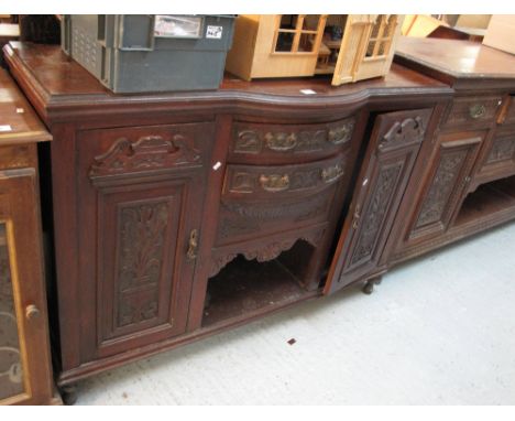 Edwardian mahogany carved bow front sideboard.