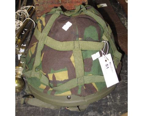 NATO type combat helmet GS Mark 6, 1985 with camouflage cover. 
