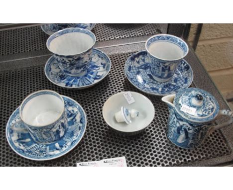 Group of assorted Chinese underglazed blue and white decorated porcelain items to include three cups and saucers, small cylin