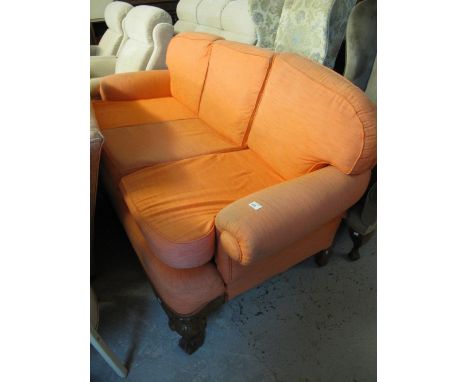 Early 20th Century walnut three seater sofa on carved ball and claw feet. 