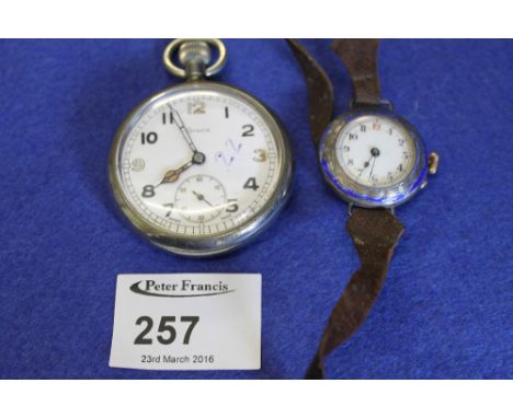 Bag containing a Grana military pocket watch mark to back GSTPJ6615 together with white metal and enamel ladies wristwatch. 