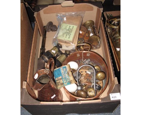 Tray of assorted items to include copper conical jug, copper two handled pan, various casters, door handles, brass egg timer,