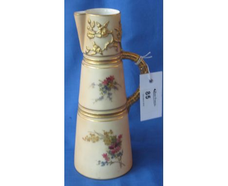 Royal Worcester porcelain conical blush ivory ground foliate decorated and gilded vase. Printed marks with shape number 1047.
