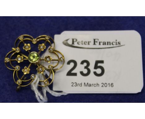 9ct gold flower design peridot and seed pearl bar brooch CONDITION REPORT: No obvious damage