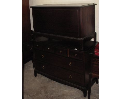 Stag mahogany bedroom suite comprising wardrobe, bed ends, trunk, chest, mirror back dressing table.