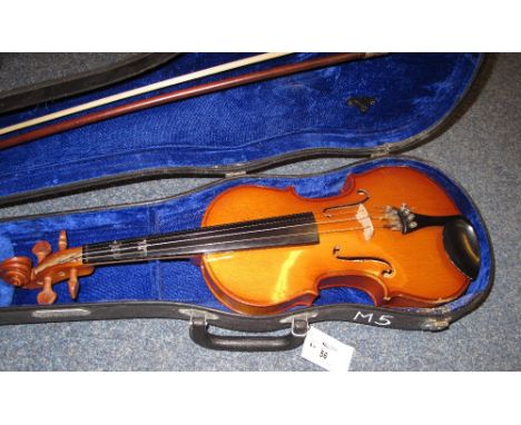 Chinese student violin with bow in plastic case.