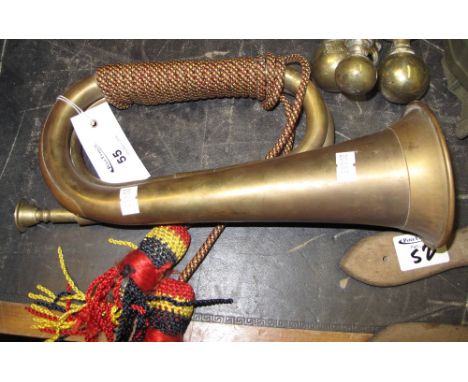 Brass bugle with braided tassels. 