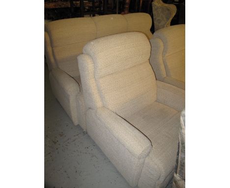 Modern cream three piece suite comprising three seater sofa and two matching armchairs. 