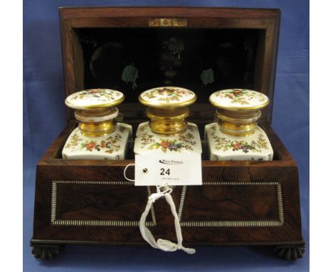 Mid 19th Century rosewood sarcophagus shaped tea caddy with beaded ivory outlines and fitted with three continental porcelain
