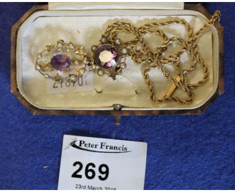 Two amethyst and seed pearl pendants, one on yellow metal chain in box. 