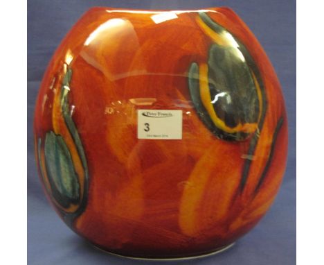 Large Poole pottery ovoid shaped vase decorated with stylized tulips on an orange and red ground. Printed marks to base. 