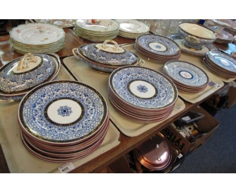 Four trays of Royal Worcester porcelain dinner service on a white ground with gilt and foliate decoration comprising oval lid