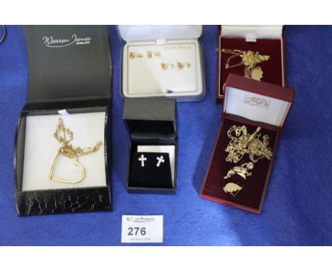 Collection of 9ct gold and yellow metal jewellery to include: heart pendant on chain; earrings; cherub pendant etc.