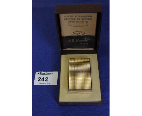 Dupont of Paris yellow metal lighter, numbered R7BG77 in original box. 