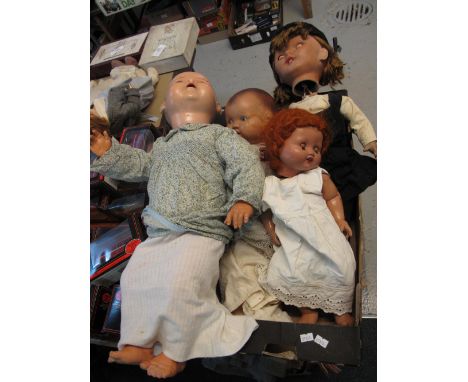 Vintage German doll marked H.W together with other vintage dolls in fitted clothing. (4)
