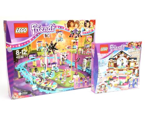 Lego Friends sets to include 41130 Amusement Park Roller Coaster, Snow Resort Ice Rink 41322. Both within Near Mint sealed bo